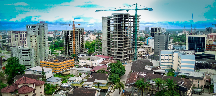 Shot of a group of builders assessing progress at a construction site